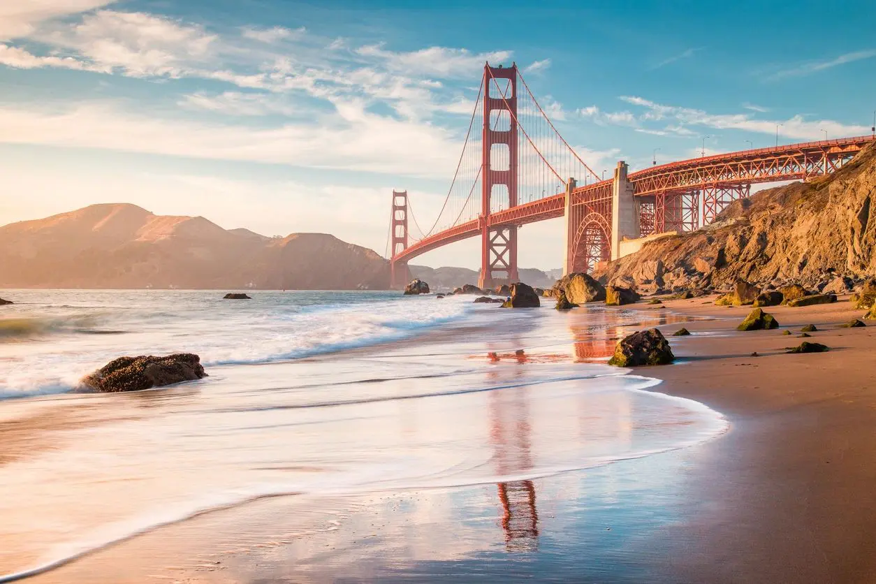 A view of the golden gate bridge from the beach.